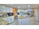 Spacious kitchen with stone countertops, ample cabinet space, and stainless steel appliances at 2836 Magnolia Ave, Lakeland, FL 33812