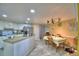 Eat-in kitchen features stone countertops and an island with a sink at 2836 Magnolia Ave, Lakeland, FL 33812