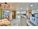 Bright kitchen features an island with sink, stone countertops, and an eating area at 2836 Magnolia Ave, Lakeland, FL 33812