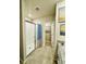 Bathroom with glass enclosed shower, granite countertop, and modern fixtures at 3208 Weitzel Dr, Haines City, FL 33844