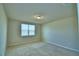 Bright bedroom with carpet floors and a light fixture that offers a relaxing retreat at 3208 Weitzel Dr, Haines City, FL 33844