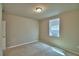 Bedroom featuring plush carpet, neutral walls, and window at 3208 Weitzel Dr, Haines City, FL 33844