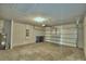 An attached garage with an automatic door provides secure parking and extra storage space at 3208 Weitzel Dr, Haines City, FL 33844
