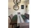 Dining room with modern chandelier, seating for six, and decor at 3227 Decatur Ave, Lakeland, FL 33805