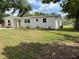 Lovely single-story home showcasing its manicured lawn, refreshed paint, and charming curb appeal at 3227 Decatur Ave, Lakeland, FL 33805