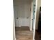 Hallway view to the half bathroom at 3227 Decatur Ave, Lakeland, FL 33805