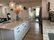 Charming kitchen with granite island and stainless appliances, perfect for cooking and entertaining at 3227 Decatur Ave, Lakeland, FL 33805