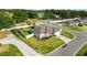 Aerial view of a well-manicured property with a fenced yard and a covered patio, nestled in a quiet neighborhood at 3425 Sutton Ridge St, Lakeland, FL 33810