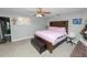 Comfortable bedroom with a queen-sized bed, decorative accents, and a soothing color palette for relaxation at 3425 Sutton Ridge St, Lakeland, FL 33810