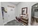 Welcoming entryway with a front door, tile flooring, and decorative accents at 3425 Sutton Ridge St, Lakeland, FL 33810