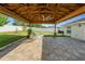 Enjoy this shaded patio with a ceiling fan, ideal for relaxing and outdoor dining while enjoying the landscaped yard at 3425 Sutton Ridge St, Lakeland, FL 33810