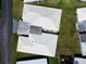 An aerial shot reveals the home's tile roof and the surrounding well-maintained grassy landscape at 3570 Milano Ave # 3570, Lakeland, FL 33803