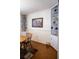 Cozy dining area features built-in shelving, decorative items, and a round wooden table for intimate gatherings at 3570 Milano Ave # 3570, Lakeland, FL 33803