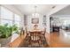Charming dining room with natural light, built in shelving, and adjacent living spaces at 3570 Milano Ave # 3570, Lakeland, FL 33803