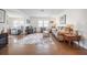 Inviting living room with hardwood floors, ample seating, and natural light at 3570 Milano Ave # 3570, Lakeland, FL 33803