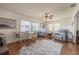 Inviting living room with wood floors, natural light, and cozy seating, perfect for relaxation at 3570 Milano Ave # 3570, Lakeland, FL 33803