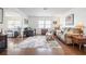 Spacious living room featuring hardwood floors and comfortable furniture at 3570 Milano Ave # 3570, Lakeland, FL 33803