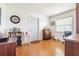 Inviting office space with laminate wood floors, desk, and natural light through the window at 3570 Milano Ave # 3570, Lakeland, FL 33803