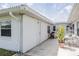 A covered patio offers an outdoor space with seating arrangements and natural light at 3570 Milano Ave # 3570, Lakeland, FL 33803
