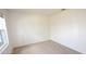 Bright bedroom with a window and neutral carpeting for a cozy feel at 3882 Resting Robin Ave, Bartow, FL 33830