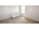 Bedroom featuring neutral carpet and a white crib at 3882 Resting Robin Ave, Bartow, FL 33830