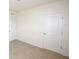 Bedroom featuring neutral carpet, two closet doors and natural light from the window at 3882 Resting Robin Ave, Bartow, FL 33830