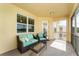 Comfortable screened balcony with seating, a view of the lake, and fresh air at 3923 Serenade Ln # 426, Lakeland, FL 33811