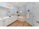 Relaxing bathroom with double sink vanity, soaking tub, and light-filled atmosphere at 3923 Serenade Ln # 426, Lakeland, FL 33811