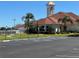Community clubhouse features manicured landscaping and convenient parking at 3923 Serenade Ln # 426, Lakeland, FL 33811