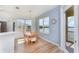 Cozy dining area with natural lighting and a scenic lake view at 3923 Serenade Ln # 426, Lakeland, FL 33811