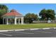 Gazebo and picnic area on the lawn with lake views at 3923 Serenade Ln # 426, Lakeland, FL 33811
