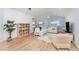 Airy living room with wood floors, neutral decor, and water view at 3923 Serenade Ln # 426, Lakeland, FL 33811