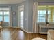 Inviting living space with a lake view and access to the screened porch at 3923 Serenade Ln # 426, Lakeland, FL 33811