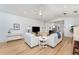 Bright and open living room with hardwood floors, and neutral decor at 3923 Serenade Ln # 426, Lakeland, FL 33811
