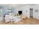 Spacious living room with comfortable seating and serene lake views at 3923 Serenade Ln # 426, Lakeland, FL 33811