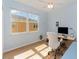 Bright office space with natural light, a modern desk, and a comfortable white chair at 3923 Serenade Ln # 426, Lakeland, FL 33811