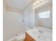 Bathroom featuring a standing shower with tile and a vanity with an integrated sink at 407 Ne 8Th St, Mulberry, FL 33860