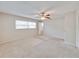 Bedroom with carpet and natural light streaming through the windows at 407 Ne 8Th St, Mulberry, FL 33860
