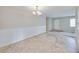 This dining room features white wainscotting, tile floors, and a chandelier at 407 Ne 8Th St, Mulberry, FL 33860