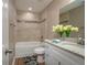 Well-lit bathroom featuring granite counters and shower-tub combo at 4189 Radford Rd, Bartow, FL 33830