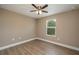 Bedroom with wood floors and natural light at 4189 Radford Rd, Bartow, FL 33830