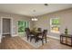 Dining room with table and chairs set, natural light, and view to backyard at 4189 Radford Rd, Bartow, FL 33830