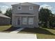 Inviting new construction home featuring a covered front porch, concrete driveway and a well manicured front lawn at 4189 Radford Rd, Bartow, FL 33830