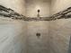 Shower with a decorative tile accent strip and a shower head at 4189 Radford Rd, Bartow, FL 33830