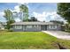 Charming single-story home with a well-maintained lawn and classic curb appeal at 4215 Sunnyside Dr, Lakeland, FL 33810