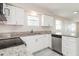 Clean kitchen with stainless appliances, granite countertops, and ample storage space at 4215 Sunnyside Dr, Lakeland, FL 33810