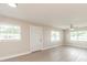 Bright, airy living room with neutral walls, light flooring, and ample natural light at 4215 Sunnyside Dr, Lakeland, FL 33810