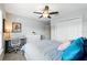 Cozy bedroom with plush carpet, a ceiling fan and double door closet at 4412 Reding Way, Lakeland, FL 33813