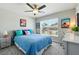 Bright bedroom with colorful decor, a ceiling fan, and a window at 4412 Reding Way, Lakeland, FL 33813