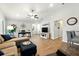 Spacious living room featuring high ceilings, wood floors, and ample natural light at 4412 Reding Way, Lakeland, FL 33813